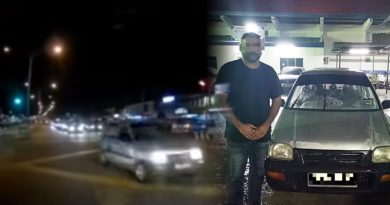 闯红灯举不雅手势 路霸遭警方逮捕