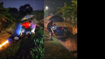 雨太大视线受阻 轿车撞大沟 司机险冲走