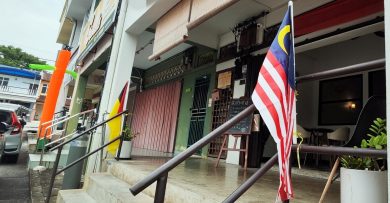 商家闻“旗”色变 有人拍照问市议员：这样挂对吗？